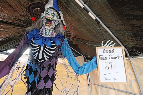 A ghoul is part of a photo booth that shows how many food items had been donated before the first day of scares. (Connor McDowell/The Brandon Sun)
