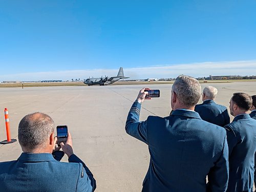 CHRIS KITCHING / FREE PRESS
The retirement ceremony concluded with a fly-by from one of two remaining Winnipeg-based CC-130H Hercules that will be in service until November.
