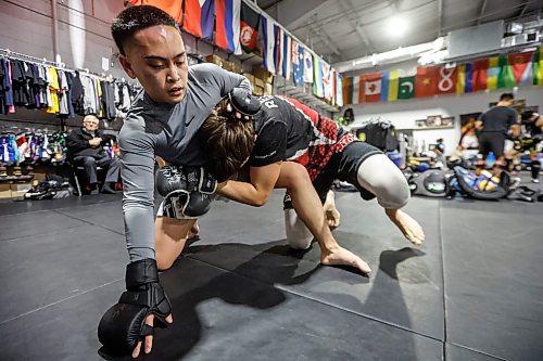JOHN WOODS / FREE PRESS
Aidan Labao (left) spars with Yurii Banadyha during a training session at Dave’s Gym in Winnipeg on Monday. Labao won his first amateur bout with a TKO in less than a minute.