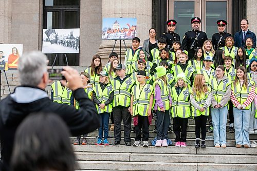 MIKAELA MACKENZIE / FREE PRESS
	

CAA school patrols celebrate the program’s 90th anniversary with a group photo at the Manitoba Legislative Building on Monday, Oct. 26, 2026.

Standup.
Free Press 2026