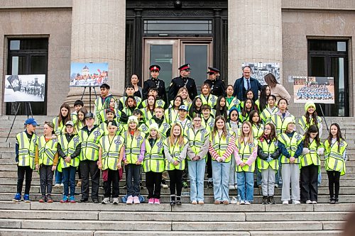MIKAELA MACKENZIE / FREE PRESS
	

CAA school patrols celebrate the program’s 90th anniversary with a group photo at the Manitoba Legislative Building on Monday, Oct. 26, 2026.

Standup.
Free Press 2026