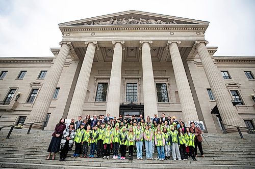 MIKAELA MACKENZIE / FREE PRESS
	

CAA school patrols celebrate the program’s 90th anniversary with a group photo at the Manitoba Legislative Building on Monday, Oct. 26, 2026.

Standup.
Free Press 2026