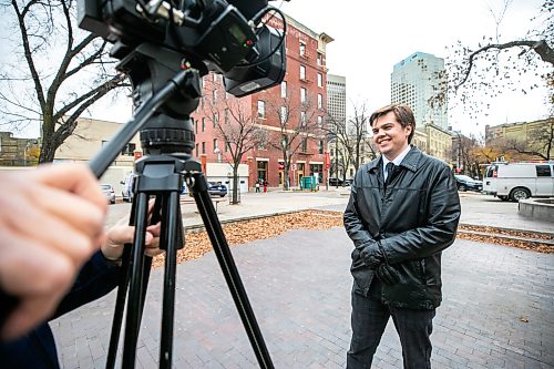MIKAELA MACKENZIE / FREE PRESS
	

Mayoral candidate Noah Reddenʤoes a media interview at Old Market Square on the last day of campaigning on Tuesday, Oct. 27, 2026.

For Ѡstory.
Free Press 2026