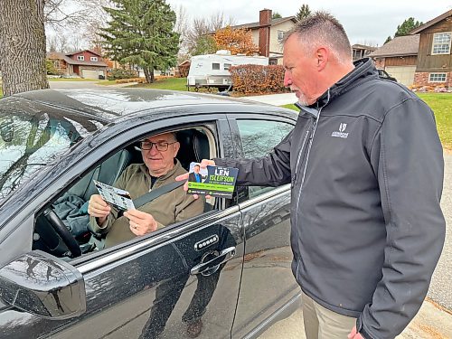 Brandon mayoral candidate Len Isleifson stops to speak with a motorist who was about to leave a driveway in Ward 3 while out door knocking in the area on Tuesday afternoon before Wednesday’s municipal election. (Matt Goerzen/The Brandon Sun)