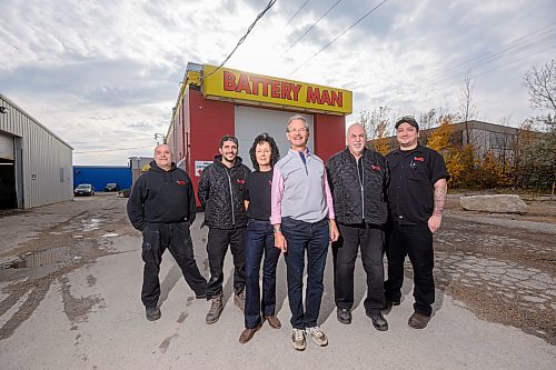 Mike Sudoma / Free Press
Owner Randy Otto (Centre) with employees at his side outside of Battery Man located at 1390 St James St
October 24, 2026


