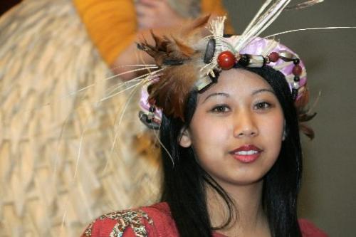 WINNIPEG: NOVEMBER 4, 2004. Krystle Pagkalinawan, who plays the part of Queen Maniwangtiwang, smiles in her headdress at a dress rehearsal of Maniwangtiwang, named after his queen,  by the Magdaragat troupe, at the Philippine Canadian Centre of Manitoba on Thursday evening. The show will be performed at a gala dinner on Saturday evening, which will be the first annual fundraiser for the centre on Keewatin. Photo by Marianne Helm/Winnipeg Free Press