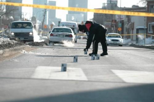 Ruth Bonneville/Winnipeg Free Press News- A police investigator lays down markers west bound on Notre Dame Ave. at Tecumseh Tuesday morning after a pedestrian was hit by a taxi at while on crosswalk.  See Story.Ruth Bonneville/Winnipeg Free Press