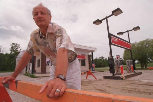 wfp101--pinawa manitoba--peter siemans, ex. dir., whiteshell advantage, economic development authority of whiteshell, stands before the only gas station in town which has now been closed down.--  july 18.97-- jeff de booy-- winnipeg free press