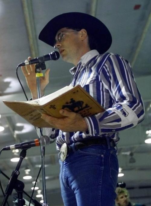 June 6, 1999--Shoal Lake, MB--Terry Baker, director of Fellowship of Christian Cowboys, presides over a church service during a high school rodeo. Photo by Fred Greenslade