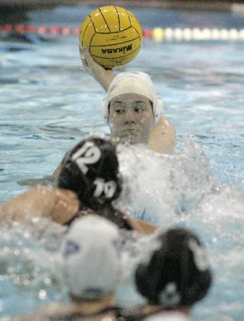 CAMO's Aicha Bouharira goes to take a shot during the 2005 Women's National Water Polo Championships at the Pan Am Pool on Sunday afternoon. CAMO played DDO I in the gold medal match-up. Photo by Marianne Helm/Winnipeg Free Press