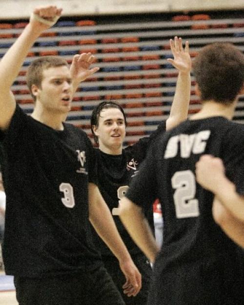 Strike's #9 Dustin Addison-Schneider (centre) raises his arms in the arm after collecting another point against the  York Junior Lions 20U from Newmarket, Ontario, at the 2005 Canadian Open gold medal round at the Duckworth Centre at the University of Winnipeg on Sunday evening. Photo by Marianne Helm/Winnipeg Free Press