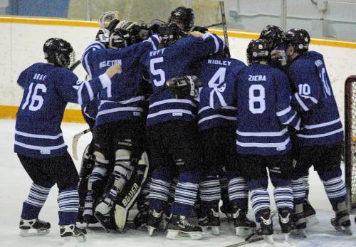 JOE BRYKSA/WINNIPEG FREE PRESS Sports-(See Chris story)-  River East Kodiaks celebate win at theAAAA Provincial High School Hockey Championship game sunday afternoon at the St James Civic Center with a 5-2 win over the Oak Park RAiders- Mar 12, 2001