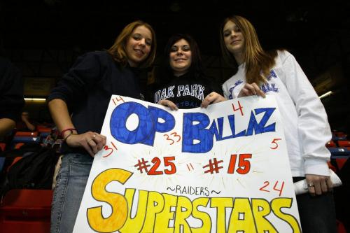 KEN GIGLIOTTI / WINNIPEG FREE PRESS / MAR 18 2004  FACES -"AAAA" PROVINCIAL BASKETBALL HIGH SCHOOL CHAMPIONSHIPS  semi FINAL -IN PIC LEFT TO RIGHT Oak Park Raiders fans  left to right , Alycia Maskiew , and sisiters RANDALL & Kaitlin Kesler , at womens  game thurs vs  River East-kg